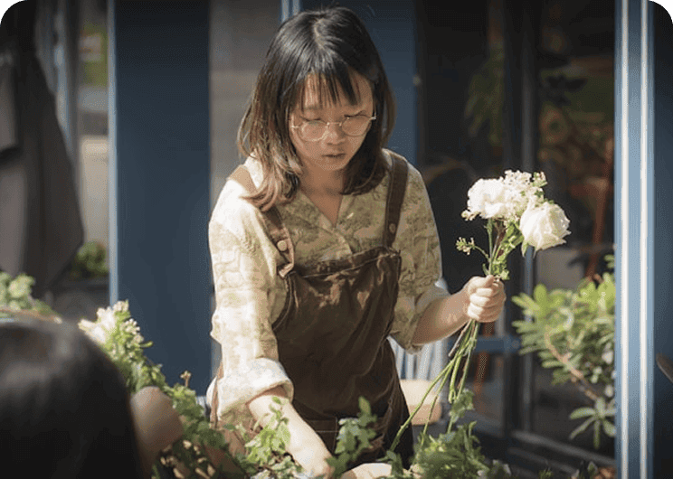 Garden worker with flowers