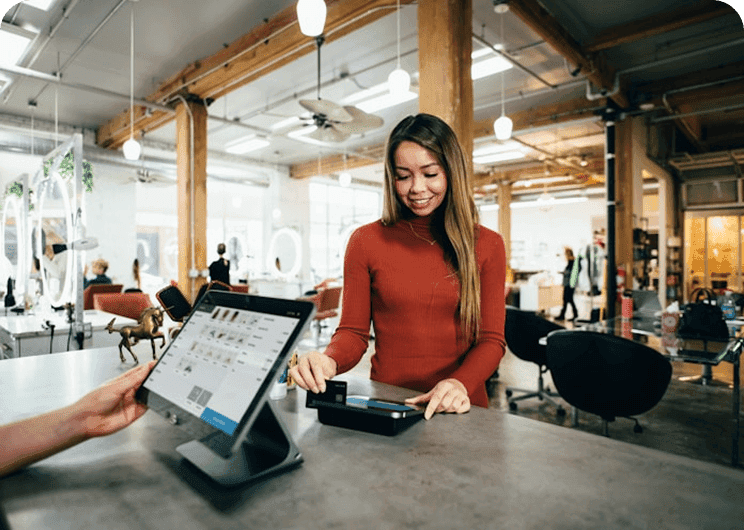 Retail worker using tablet